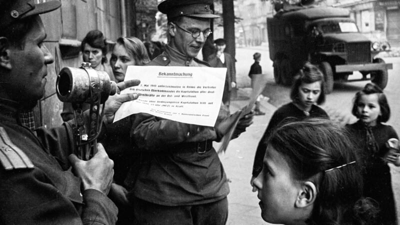 Reading of the surrender on the streets of Berlin on May 8th, 1945. Photograph: Valery Faminsky