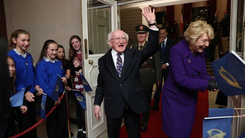 Michael D Higgins and his wife Sabina greet children following his inauguration ceremony at Dublin Castle. Photograph: Maxwells/PA Wire