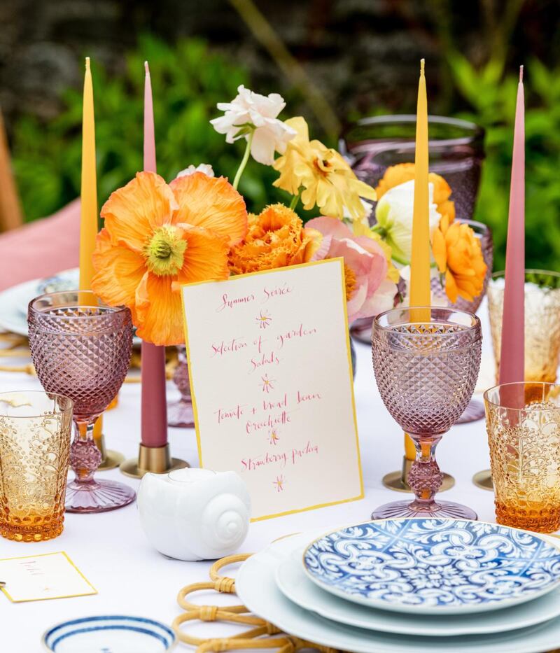 Brightly coloured tapered dinner candles along with coloured glassware will create a gorgeous glow