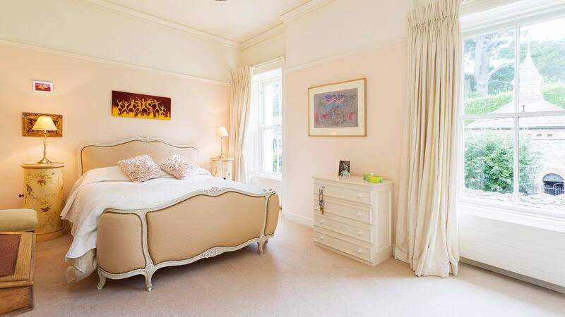 Upstairs, the four bedrooms are as elegantly presented as the downstairs rooms: in warm pastel shades, with soft carpets and long curtains, they all have built-in wardrobes