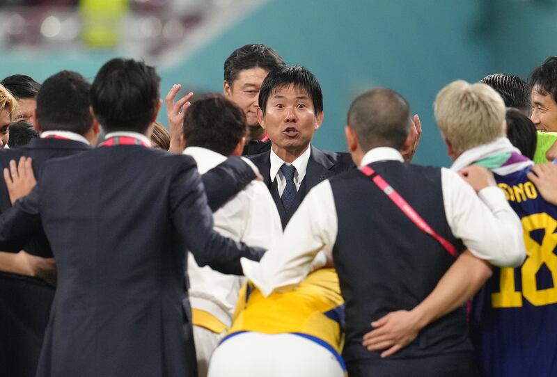 Japan manager Hajime Moriyasu with his players after the final whistle against Spain. File photograph: PA