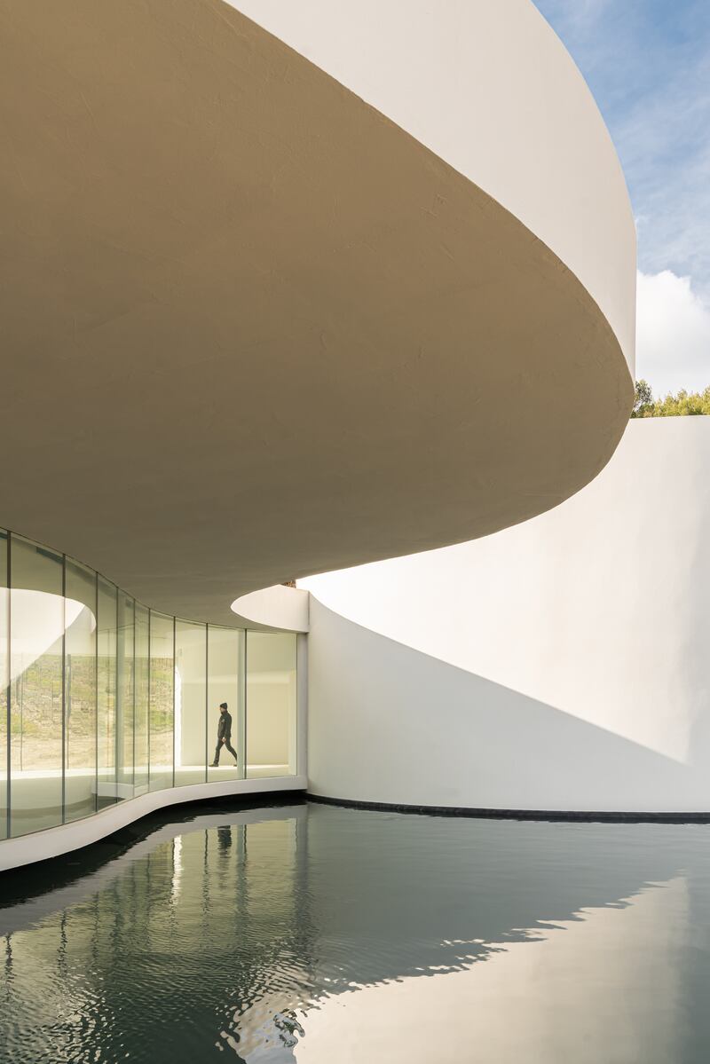 Oscar Niemeyer’s tear-shaped pavilion at Château La Coste with a cylindrical auditorium and water feature opened in September, 2022. Photograph: Stéphane Aboudaram