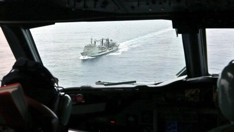 The view from a Royal Australian Air Force  AP-3C Orion looks ahead towards HMAS Success as they search for missing Malaysian Airlines flight MH370 debris or wreckage in Southern Indian Ocean today. Photograph: EPA