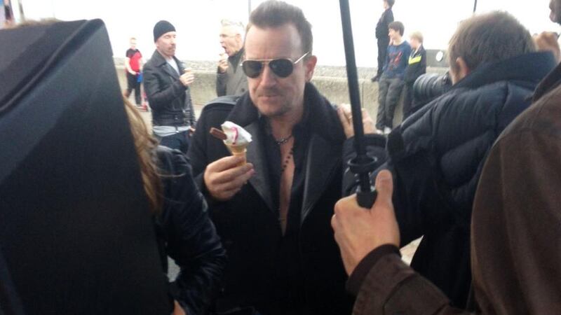 Bono enjoys an ice-cream on Bray seafront. Photograph: Jason Forde