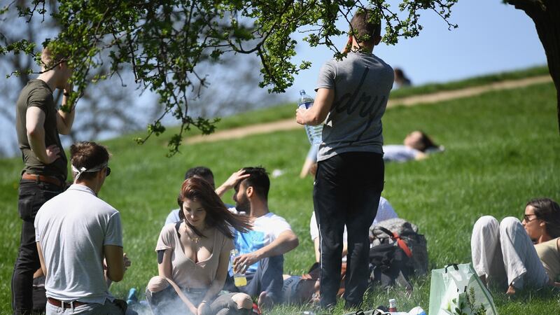 People enjoy a barbeque in the sunshine on Primrose Hill in London, England. Unseasonable warmth means the British capital  is expected to be one of the hottest places in Europe this week, with forecasters predicting possible temperatures of 26 Celsius on Thursday. Photograph: Jeff J Mitchell/Getty Images