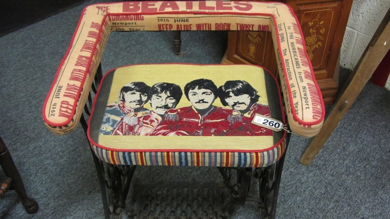 Designer Beatles chair, arms and seat covered with Andrew Martin fabric, (€400-€600) at Milltown Auction Rooms.