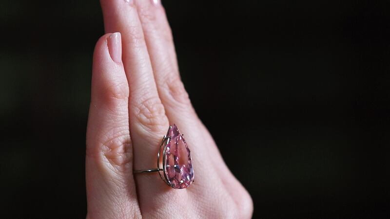 The vivid pink pear-shaped diamond weighing 15.38 carats is to be auctioned in Geneva on May 17th. Photograph: EPA