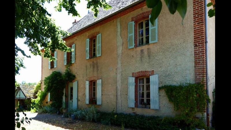 Old old schoolhouse is on the edge of a village   near St Pourcain sur Sioule in France
