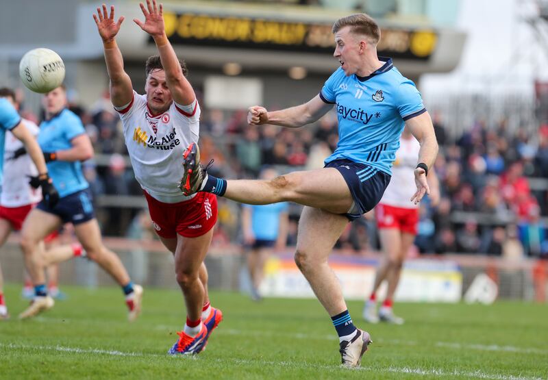 Tyrone's Michael McKernan attempts to block Dublin's Seán Bugler. Photograph: Lorcan Doherty/Inpho