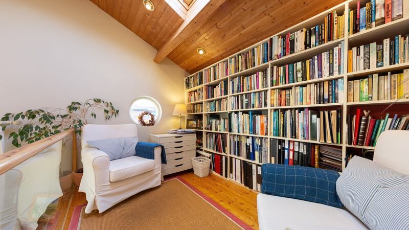 Mezzanine floor  with built-in bookshelves