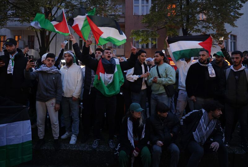 Pro-Palestinian demonstrators wave Palestinian flags on Sonnenallee in Arab-heavy Neukoelln district in Berlin this week. Photograph: Sean Gallup/Getty Images