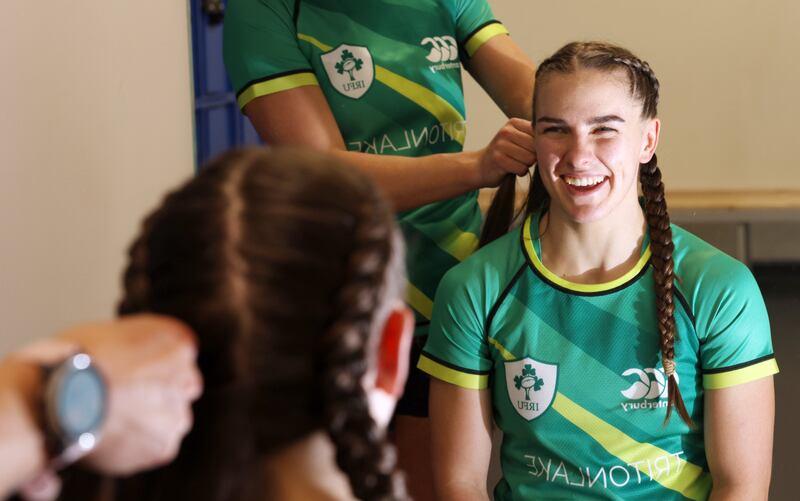 Kathy Baker braids Katie Farrell's hair in the changing rooms. Photograph: Laura Hutton