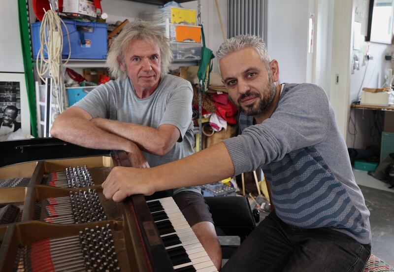 Piano tuner Ciarán Ryan and Sameh As’ad in Galway. Photograph: Joe O'Shaughnessy