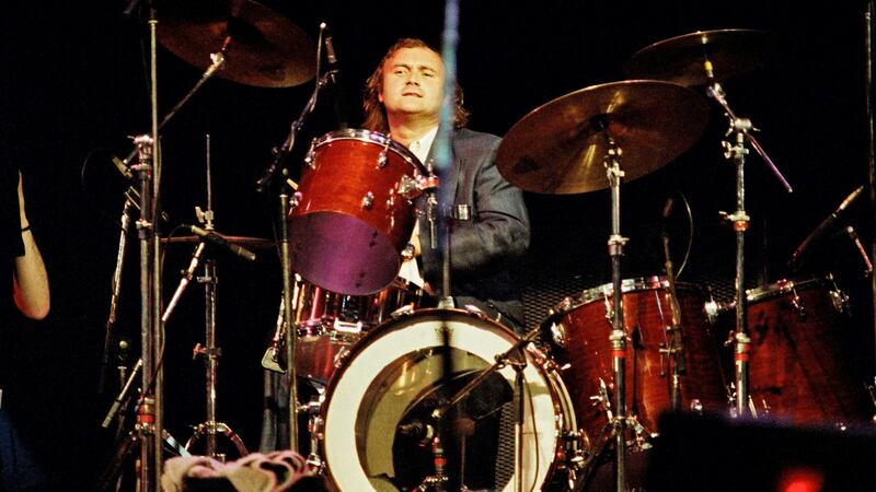 Phil Collins plays the drums on stage at Wembley Arena, 1987.  Photograph: Peter Still/Redferns
