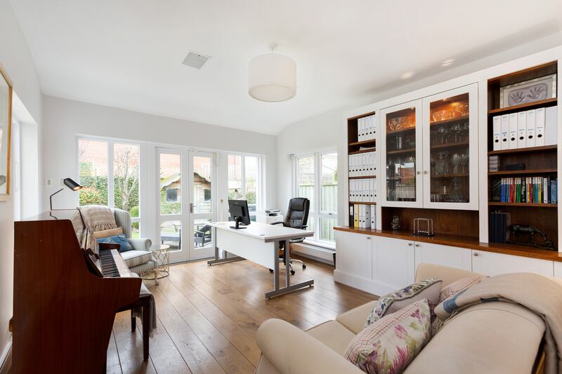 Study with doors to the back garden