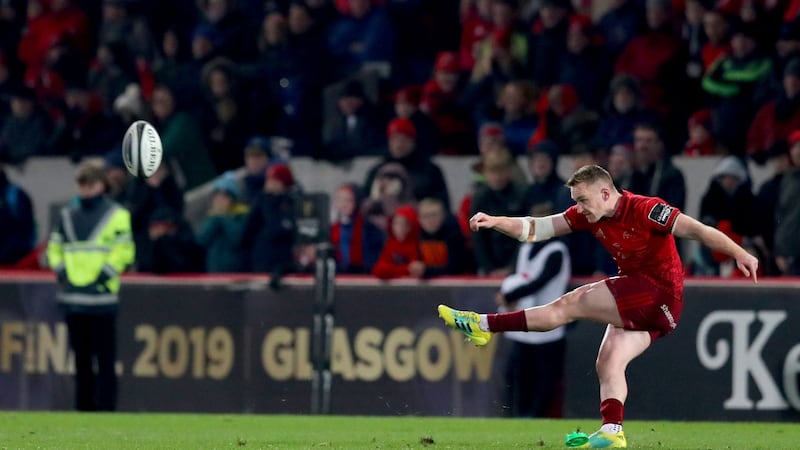 Rory Scannell kicks the winning penalty for Munster in their Guinness Pro14 clash with Glasgow Warriors in Thomond Park on Saturday. Photograph: Ryan Byrne/Inpho