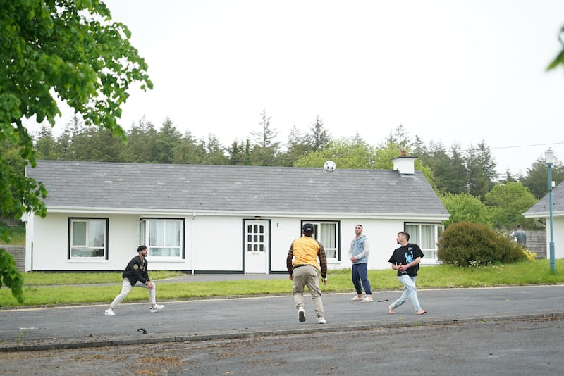 Asylum seekers play games at Magowna House Hotel outside of Ennis in Co Clare. Photograph: Enda O'Dowd