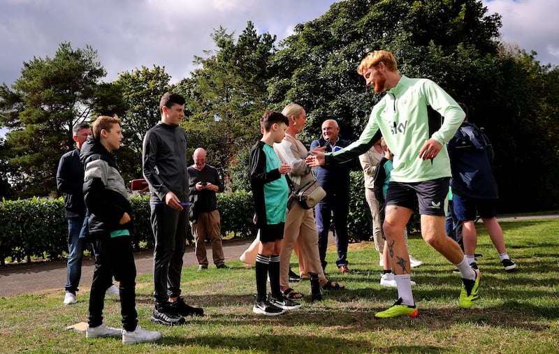 Liam Scales greets fans at training with the Republic of Ireland at the FAI National Training Centre in Dublin. Photograph: Ryan Byrne/Inpho 