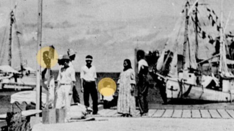The photograph purportedly showing Amelia Earhart  (circled, sitting third right) and Fred Noonan (circled) in the Marshall Islands. Photograph: Photograph: US national archives
