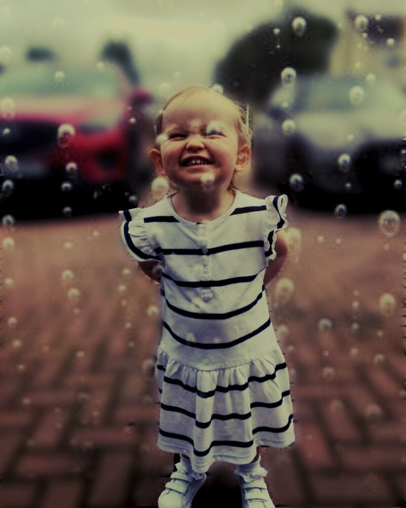 Singing in the rain. Photograph: Jason Ledwidge