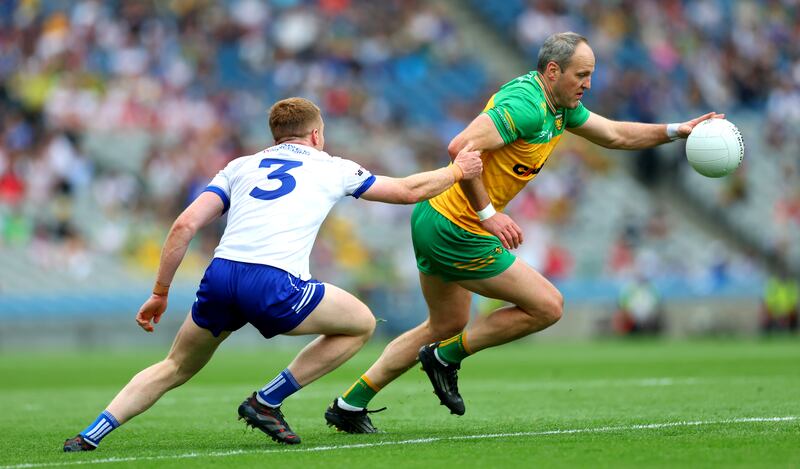 Monaghan’s Kieran Duffy and Michael Murphy of Donegal. Photograph: James Crombie/Inpho