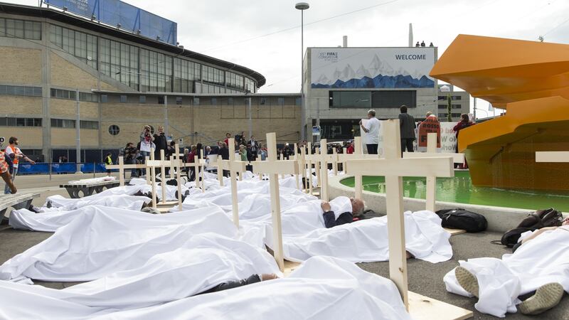 Activists are pictured during a protest called for workers rights during the 65th Fifa Congress in 2015. Photograph: Alessandro Della Bella/Getty Images