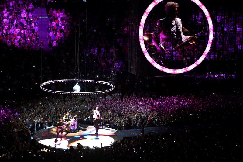 Experience + Innocence: U2 playing in Paris on Saturday. Photograph: Zakaria Abdelkafi/AFP/Getty