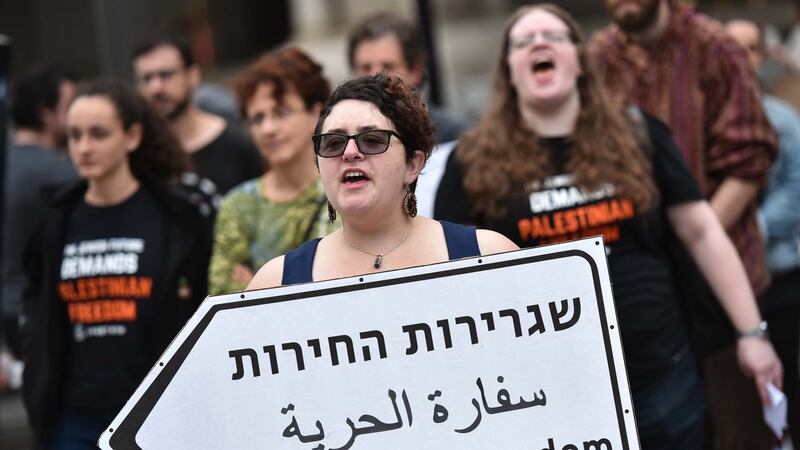Demonstrators take part in a protest outside of the Trump International Hotel in Washington, DC, against the opening of the US embassy in Jerusalem on Monday. Photograph:   Mandel Ngan/AFP/Getty Images
