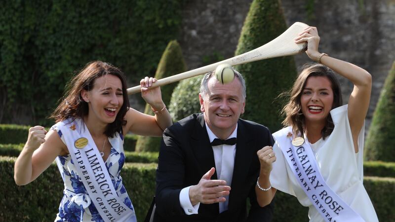 Dáithí Ó Sé with 2018 Roses Hazel Ni Chathasaigh (Limerick) and Deirdre O’Sullivan (Galway) at the Gardens in Kilmainham Hospital in Dublin. Photograph: Collins