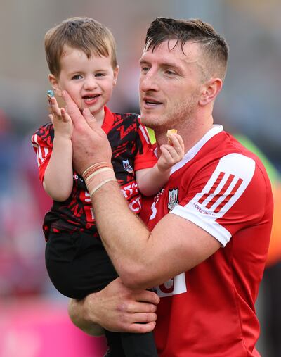Cork’s Patrick Horgan with his son Jack. Photograph: James Crombie/Inpho