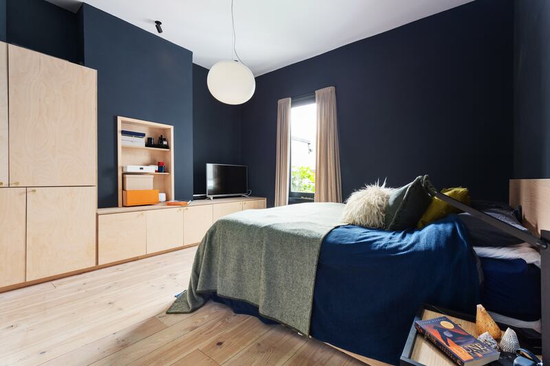 Bedroom with bespoke cabinetry