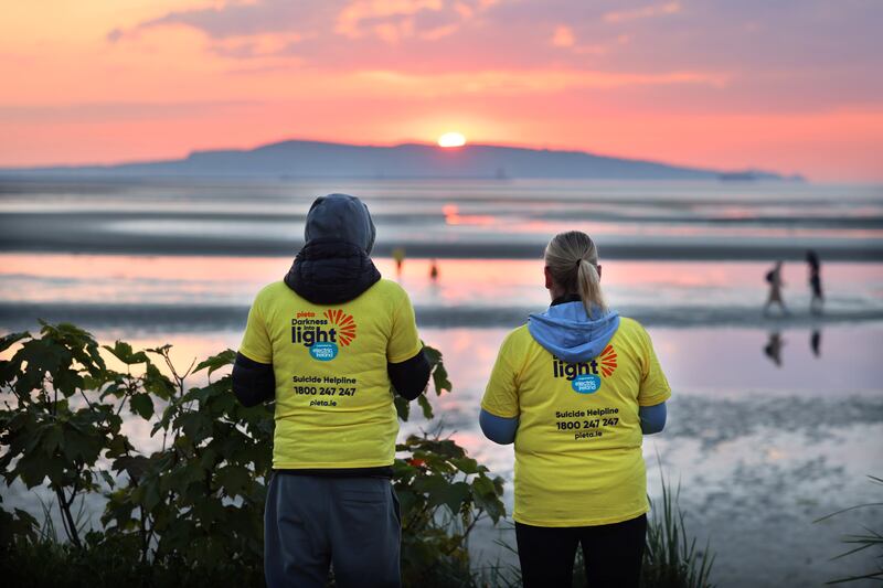 Adam and Elaine Kennedy from Donaghmede during Darkness into Light, Sandymount, Dublin. Photograph: Dara Mac Dónaill