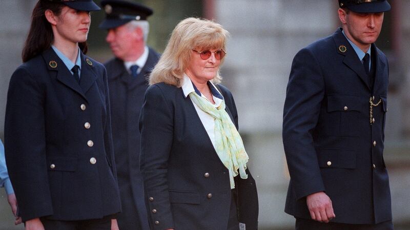 Catherine Nevin being lead away after her conviction for murder in 2000. Photograph: Dara Mac Dónaill