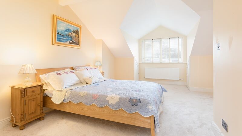 Of the four bedrooms at 22 Ardagh Drive in Blackrock, two doubles are upstairs and their rear-facing dormer windows offer panoramic, if distant, sea views.