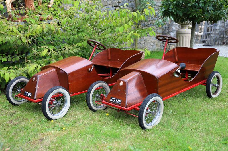 Two handmade children’s pedal go-karts (€1,400-€1,800).