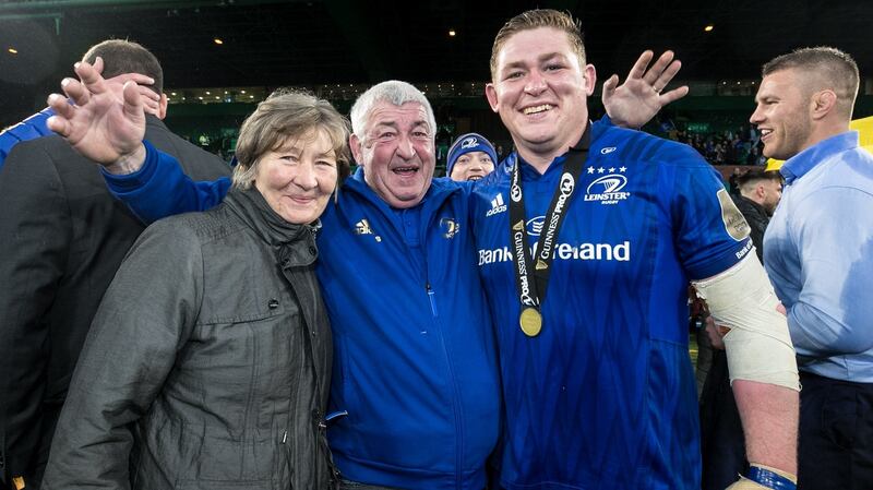 Tadhg Furlong celebrates with his parents Margaret and James after Leinster’s win over Glasgow Warriors in the 2019 Guinness Pro 14 Final at Celtic Park. Photograph:  Billy Stickland/Inpho
