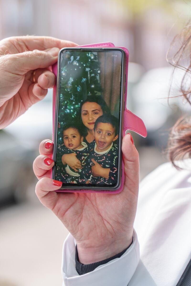 Mandy Kelly showing a photograph of her sons Zayn and Kareem who have been in Egypt for two years. Photograph: Barry Cronin