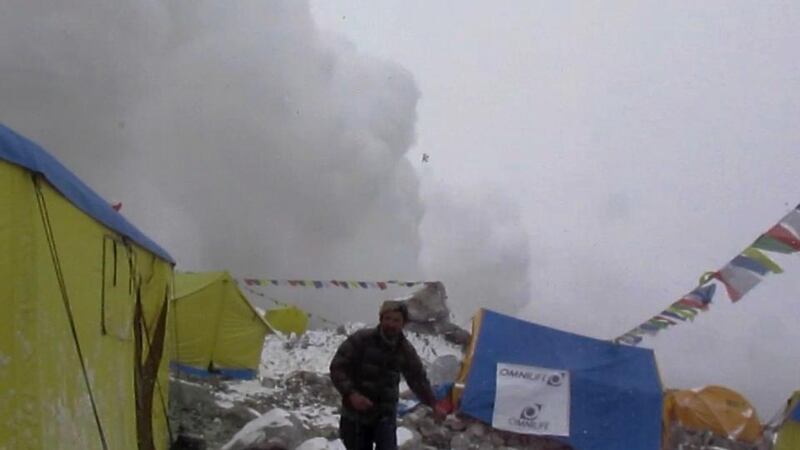I captured this just as we turned around and saw the Pumori avalanche about to hit our camp at Everest base camp in Nepal (Paul Devaney).