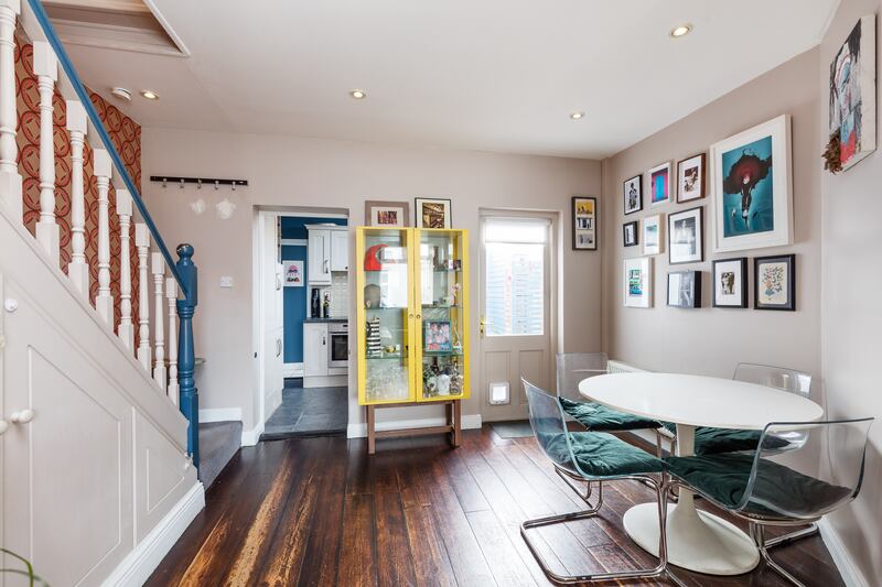 The kitchen is off the open plan living/dining area. Photographs: Wojtek Barkowski