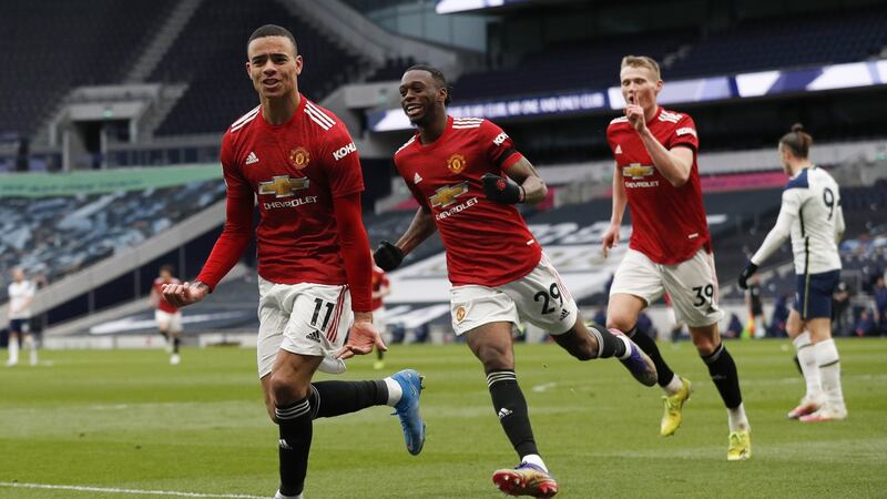 Manchester United’s Mason Greenwood celebrates after scoring his side’s third against Spurs. Photograph: Adrian Dennis/EPA