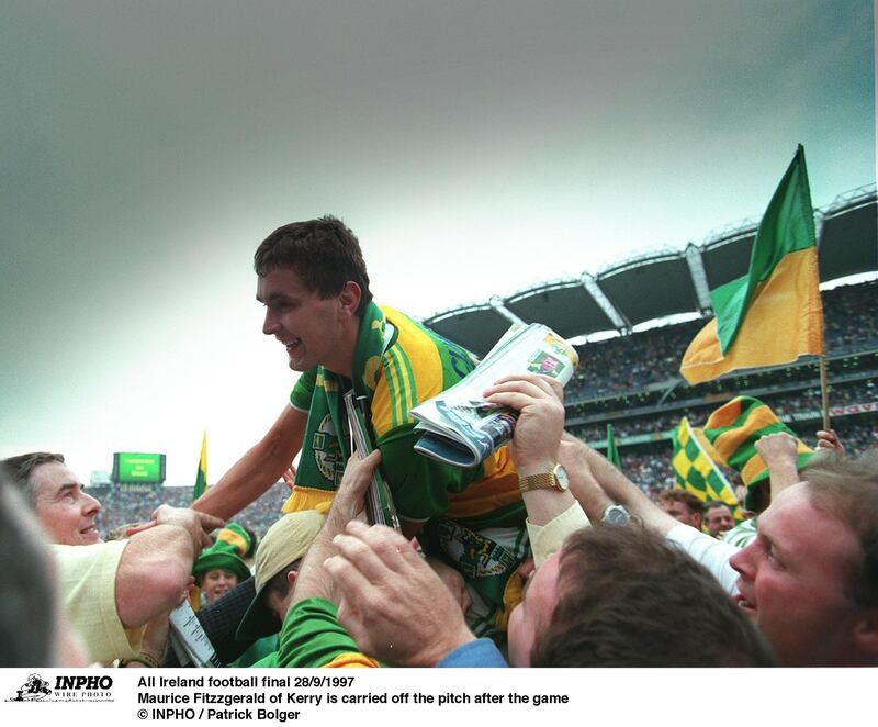 Maurice Fitzgerald of Kerry is carried off the pitch after victory over Mayo in the 1997 All-Ireland football final. Patrick Bolger/Inpho