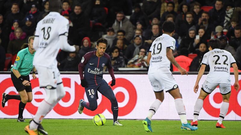 Neymar controls the ball during the Ligue 1 match between Paris Saint-German and Dijon. Photograph: Christophe Archambault/AFP/Getty Images