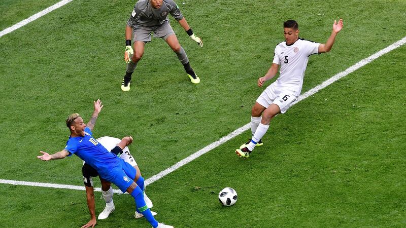Brazil v Costa Rica: Giancarlo Gonzalez vies with Neymar. Photograph: Giuseppe Cacace/AFP/Getty Images