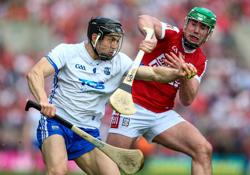 Waterford’s Jamie Barron in action against Cork's Brian Roche in this year's Munster SHC match at Páirc Uí Chaoimh. Photograph: Ken Sutton/Inpho
