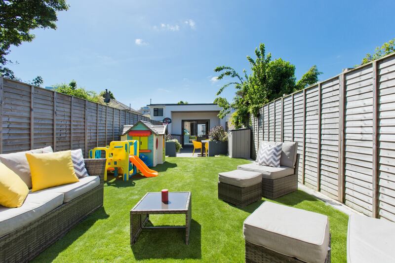 Looking down the garden to the 22sq m garden room.