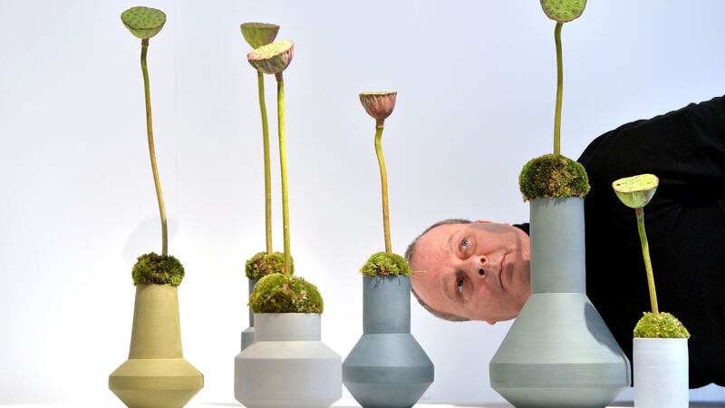 2nd Arts and Entertainment: Master florist Lamber de Bie inspecting a special floral installation at VASE, an international display of contemporary vessels at Farmleigh Gallery, Dublin. Photograph: Alan Betson / The Irish Times