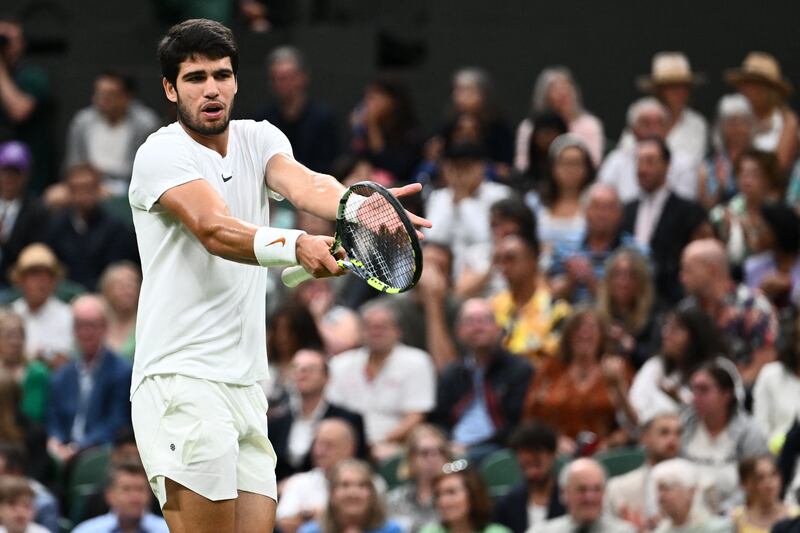Carlos Alcaraz in action during his semi-final victory over Russia's Daniil Medvedev at Wimbledon. Photograph: Sebastien Bozon/AFP/Getty Images 