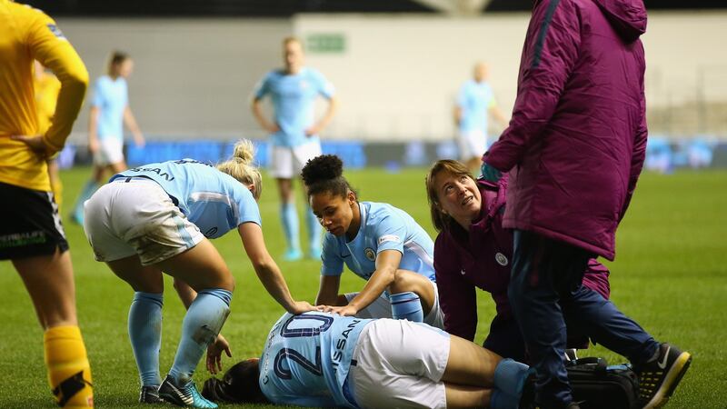 Megan Campbell  lies on the ground  injured during the   Women’s Champions League match against  LSK Kvinner in November 2017 in Manchester, England. Photograph: Getty Images