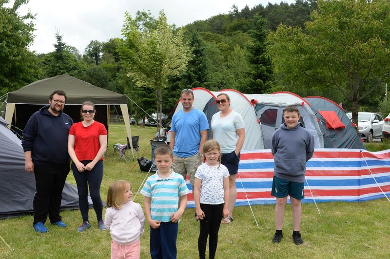 Campers Mark and Ella Collins (back left) with Ciaran and Ciara Halpin, with children Emma Halpin, Jack Halpin, Ruby O’Brien and Darragh Halpin. Photograph: Dara Mac Dónaill