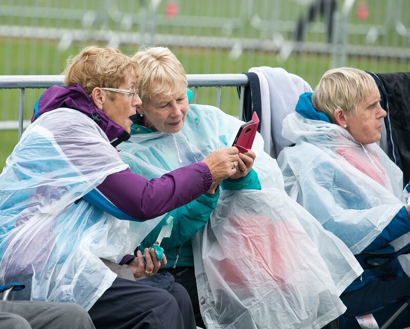 A scene from the Phoenix Park in advance of the Pope's arrival. Pictured are Irene O'Brien, Mary Murphy and Jean Kennelly from Swords. Photograph: Dave Meehan/The Irish Times